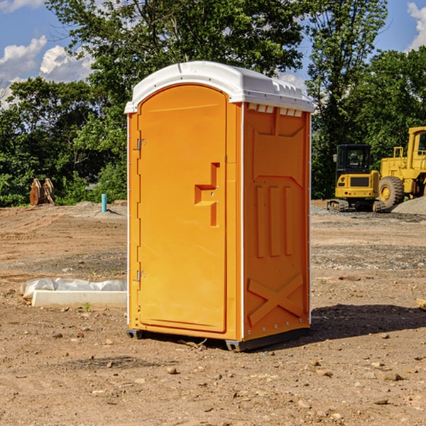 how often are the porta potties cleaned and serviced during a rental period in Woodland IL